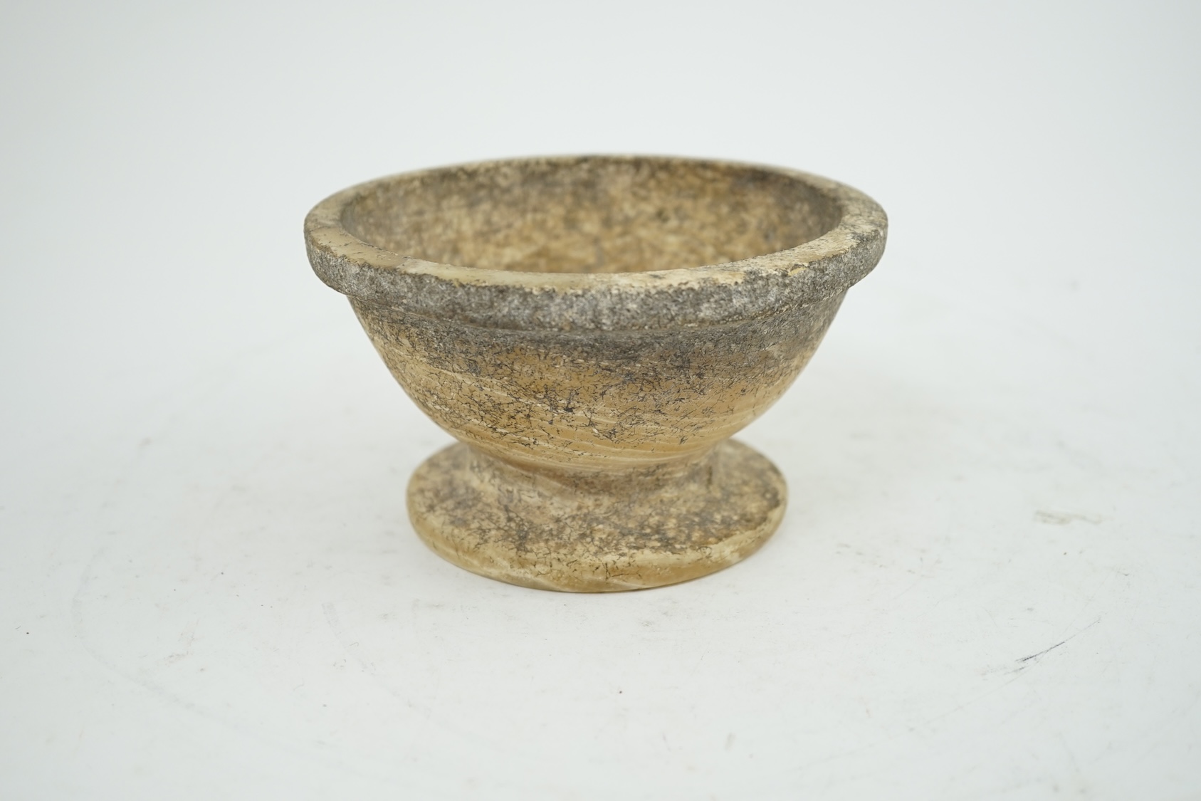 An archaic alabaster footed bowl, possibly Egyptian